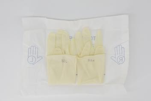 外科のための無菌の白い乳液の外科手袋